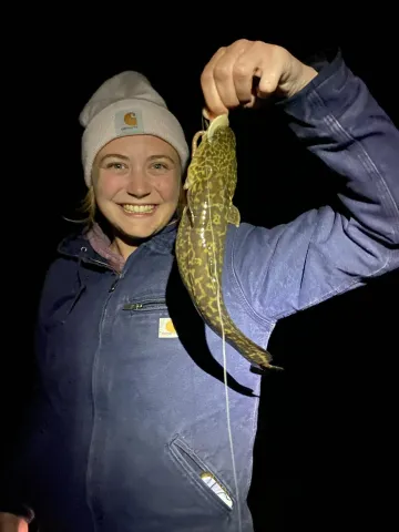 Woman holding Burbot