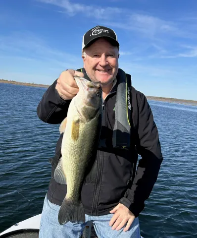 John Kruse holding largemouth bass