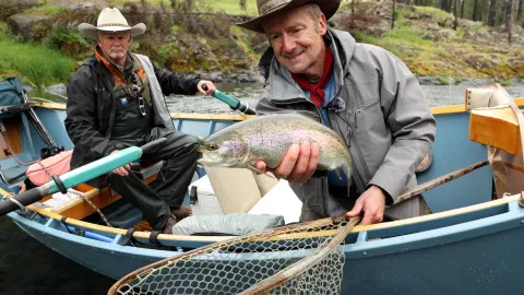 Gary Lewis holding a huge trout