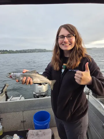 Hannah Pennebaker holding a kokanee.