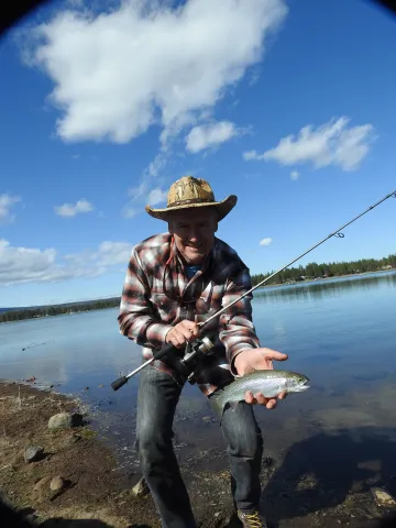Gary Lewis with a hatchery rainbow caught on jar bait. Photo by Gary Lewis.