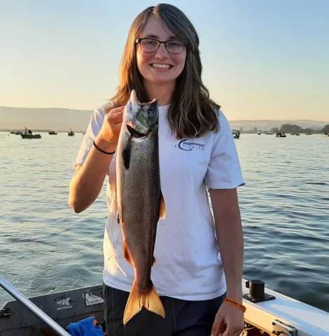 Hannah Pennebaker holding salmon