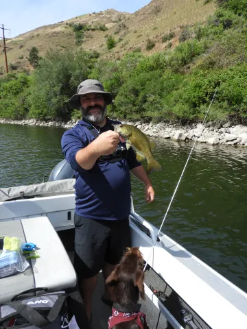 Man holding smallmouth bass.