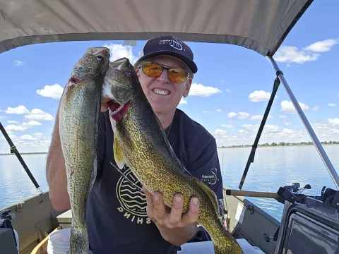 Mike Carey with two walleye