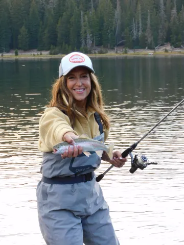 Woman holding trout