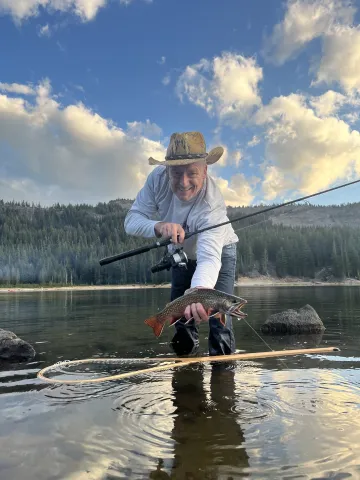 Gary Lewis with a trout