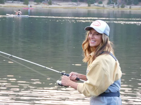 Woman trout fishing