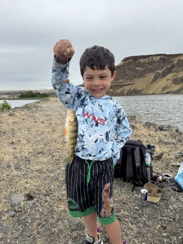 Child with small perch
