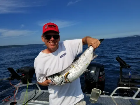 Mike Carey with Coho salmon