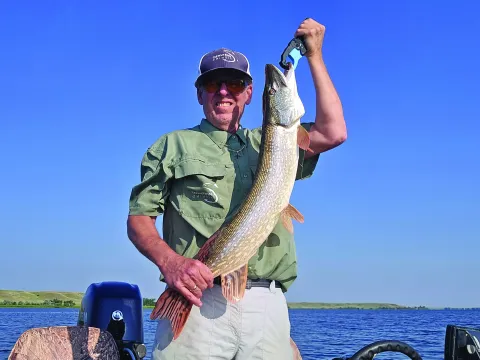 Mike Carey holding a Pike.
