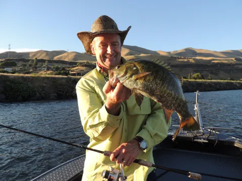 Gary Lewis holding bass.